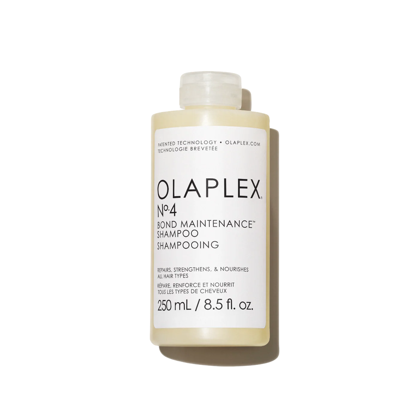 Olaplex No.4 Bond Maintenance Shampoo bottle on a white background